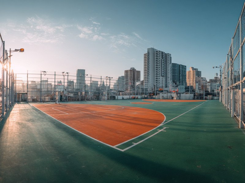 Modular tile basketball court