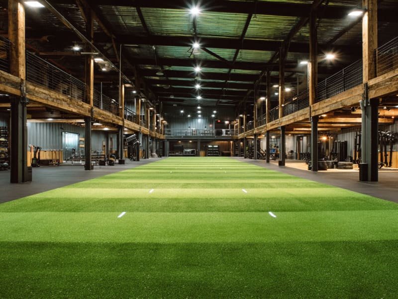 artificial gym turf surface with training equipment