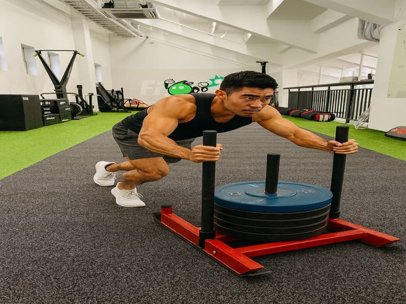 layers of gym flooring showing underlayment
