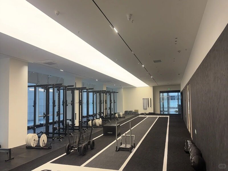 Gym with artificial turf training area