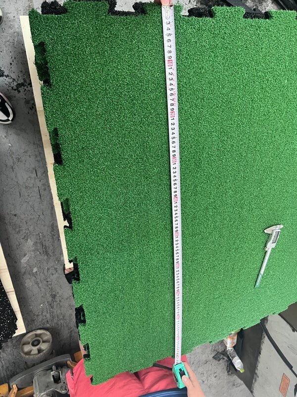 gym turf with custom logo and lane markers