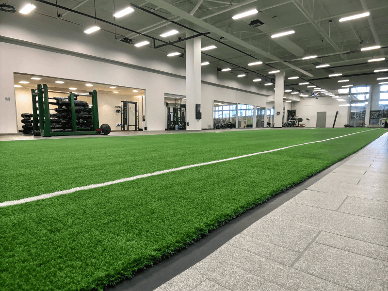 Processus d'installation du gazon de gymnastique