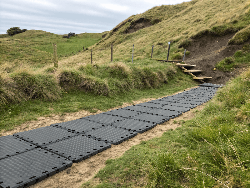 OCR flooring installed on uneven grass terrain